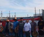Chief Atleo posing with Musqueam drummers